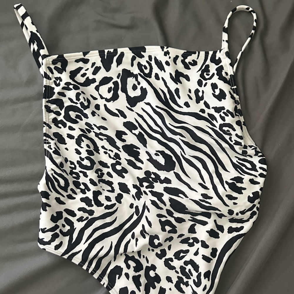 Cheeky one piece 🤍